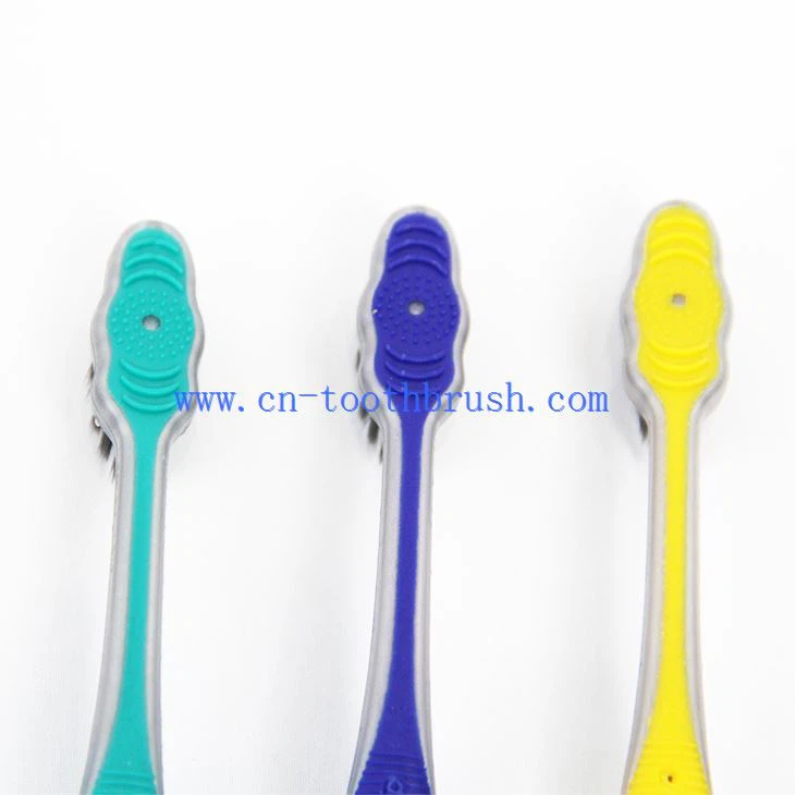 The Back Of Wavy Head Toothbrush With Long Soft Handle